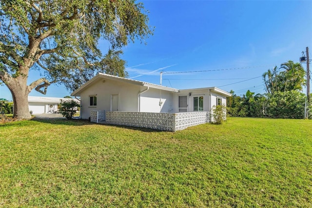 exterior space featuring a lawn