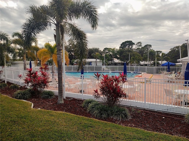 view of swimming pool with a patio area