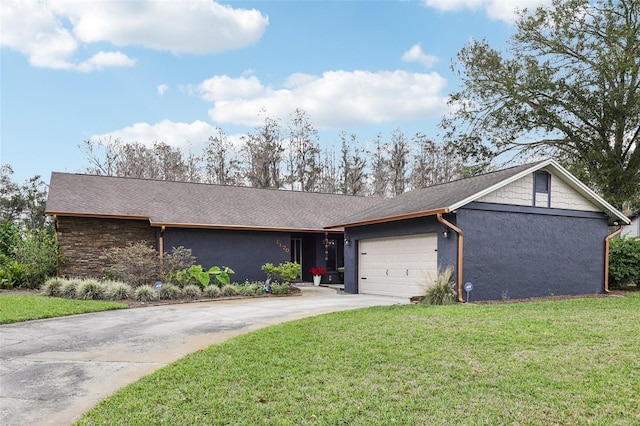 single story home with a front lawn and a garage