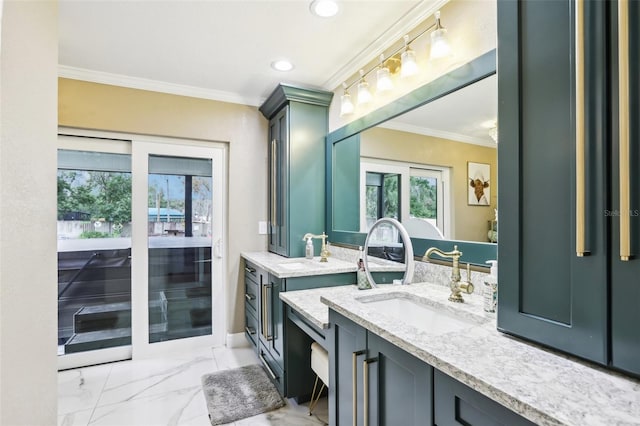 bathroom with vanity and ornamental molding