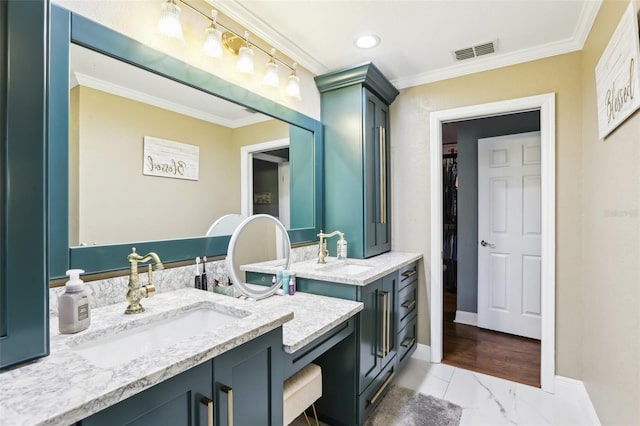 bathroom featuring vanity and crown molding