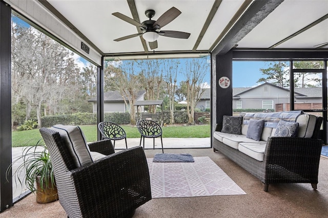 sunroom / solarium with ceiling fan