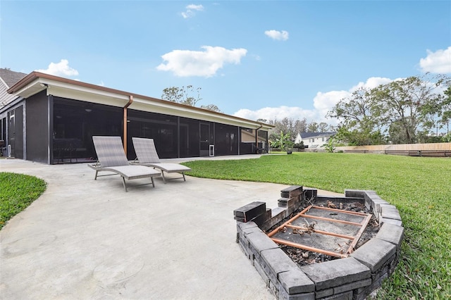 view of patio featuring a sunroom