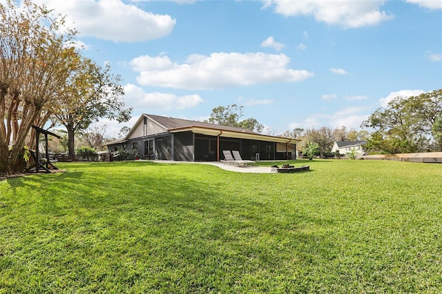 view of yard with a sunroom