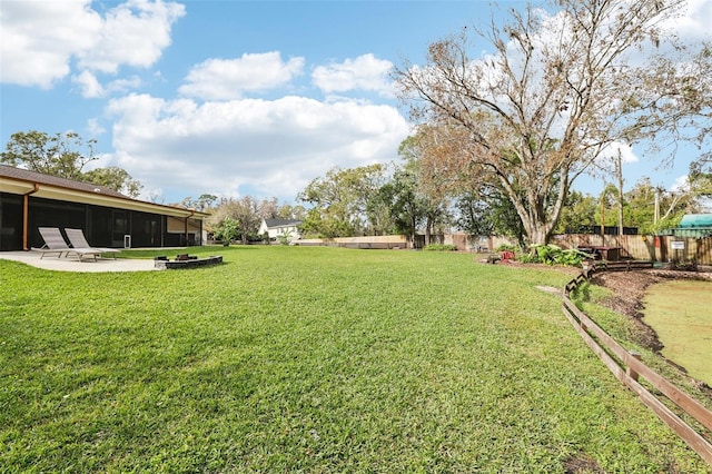 view of yard with a sunroom