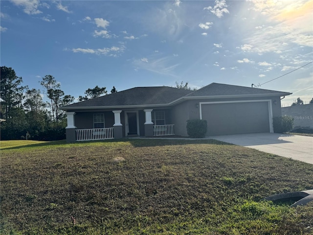 ranch-style house with a garage, covered porch, and a front yard