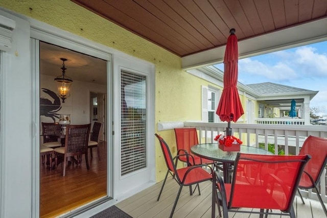 sunroom with wooden ceiling