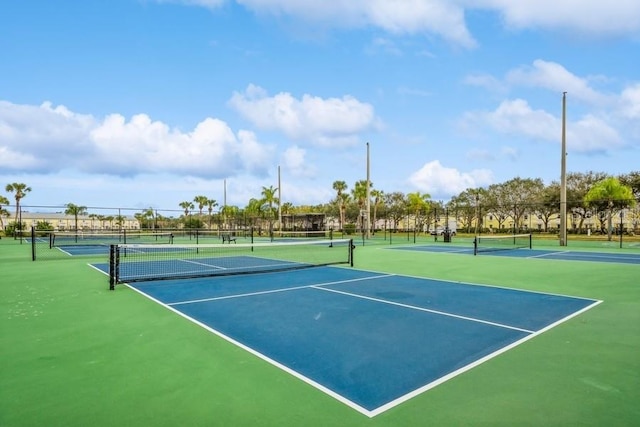 view of tennis court featuring basketball court