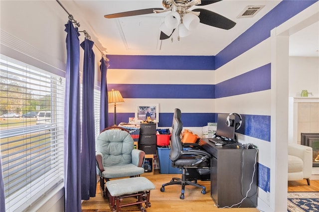 office space with ceiling fan and hardwood / wood-style floors