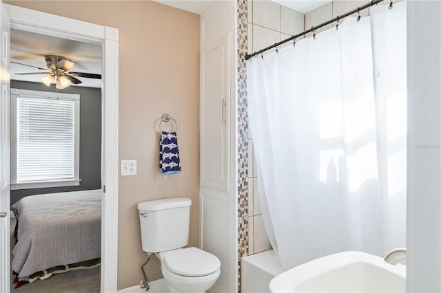 bathroom with ceiling fan and toilet