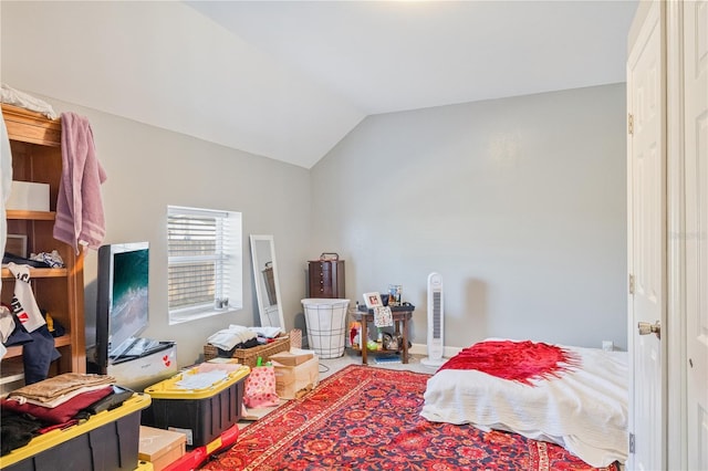 bedroom with vaulted ceiling