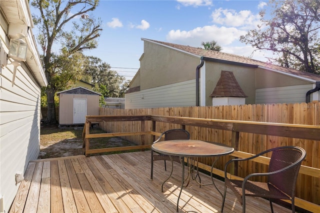 wooden deck with a storage unit