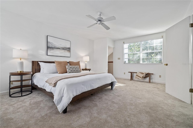 bedroom featuring carpet flooring, a ceiling fan, and baseboards