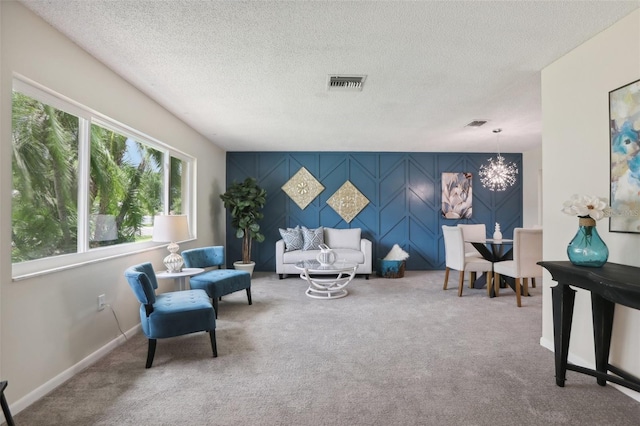 living room with carpet flooring and a textured ceiling