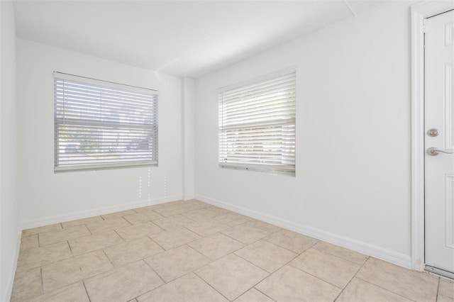 view of tiled empty room