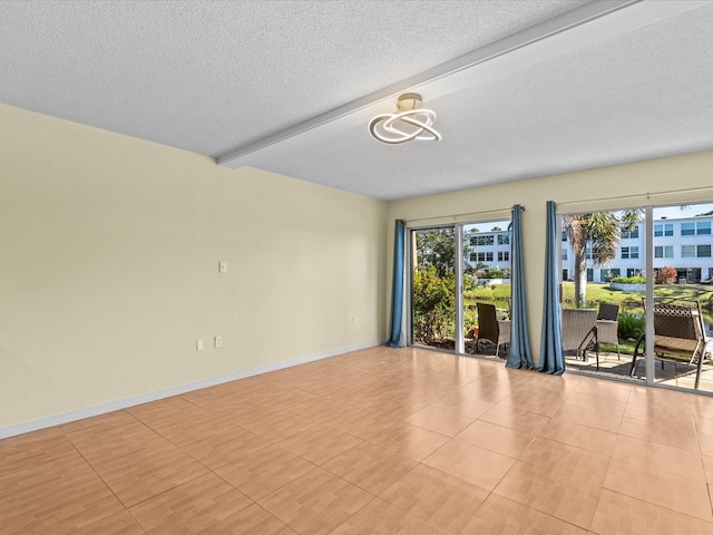 unfurnished room with beam ceiling, light tile patterned floors, and a chandelier