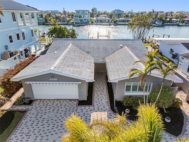 bird's eye view with a water view