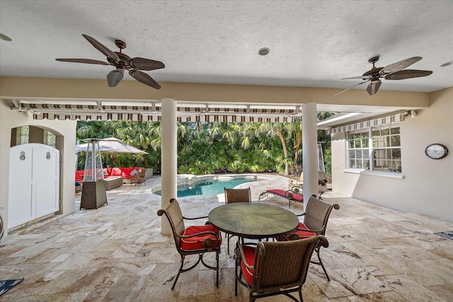 view of patio / terrace featuring outdoor lounge area and ceiling fan