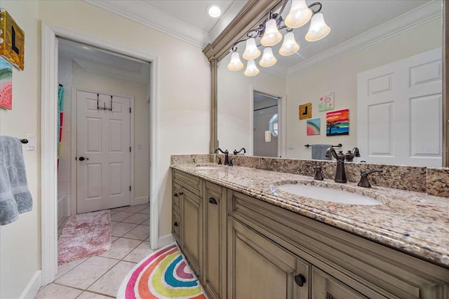 bathroom featuring tile patterned flooring, vanity, a chandelier, and crown molding