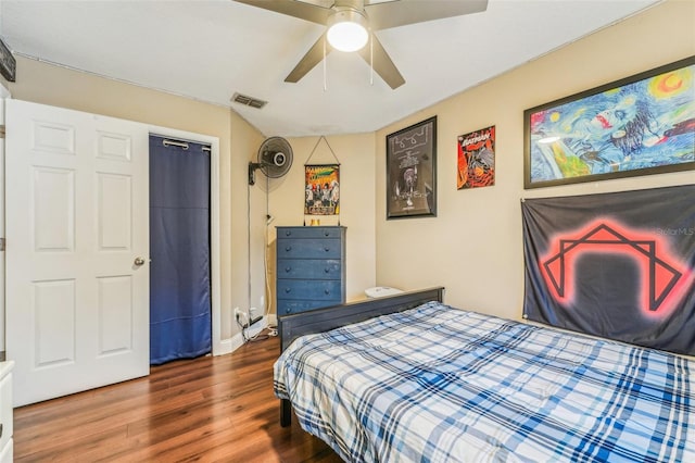 bedroom featuring ceiling fan and hardwood / wood-style flooring