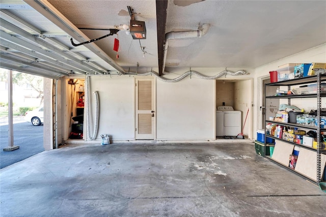 garage with washing machine and dryer