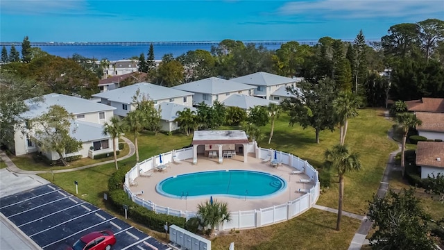 birds eye view of property featuring a water view