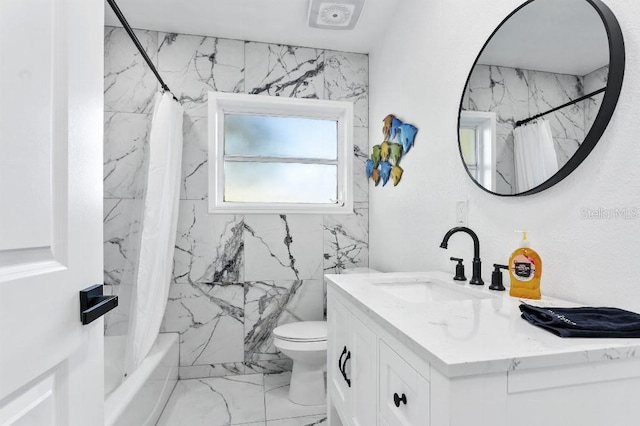 full bathroom featuring vanity, shower / bath combination with curtain, and toilet