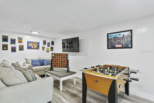 game room featuring hardwood / wood-style floors