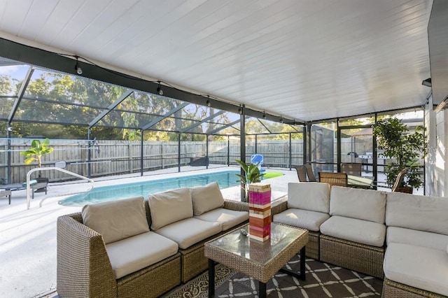 sunroom / solarium with a pool and a wealth of natural light