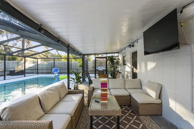 view of patio with an outdoor hangout area, a fenced in pool, and glass enclosure