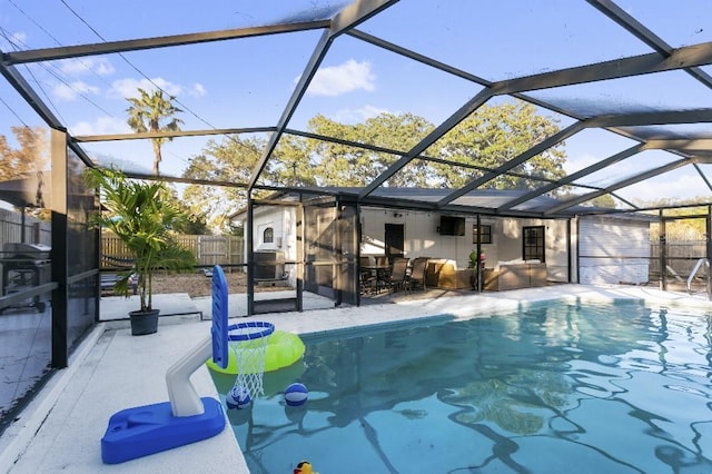 view of swimming pool featuring a lanai, a grill, central AC unit, and a patio area