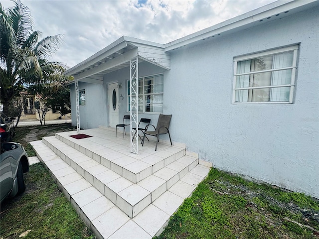 view of patio featuring a porch