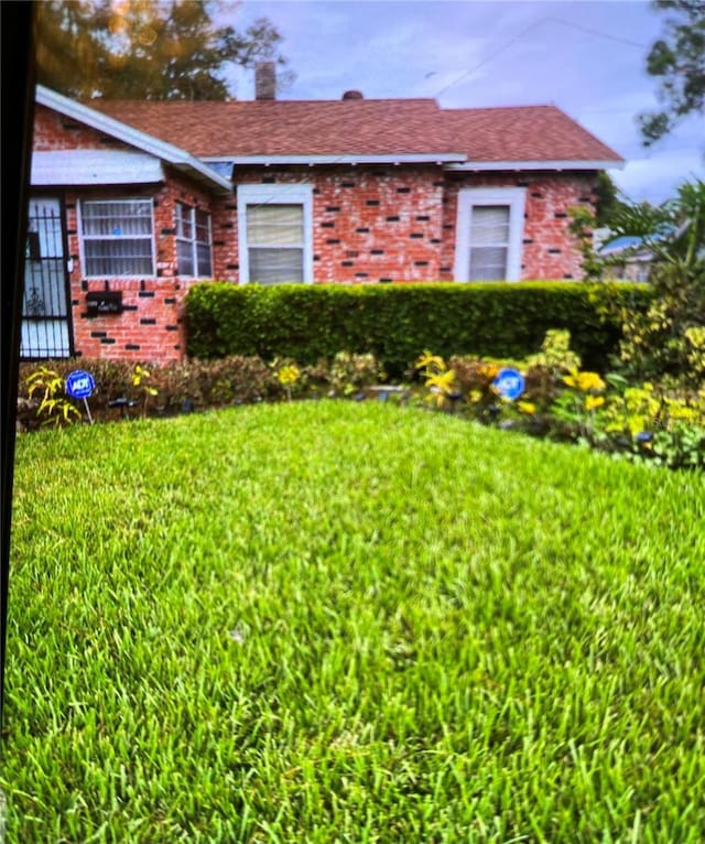 exterior space featuring a yard