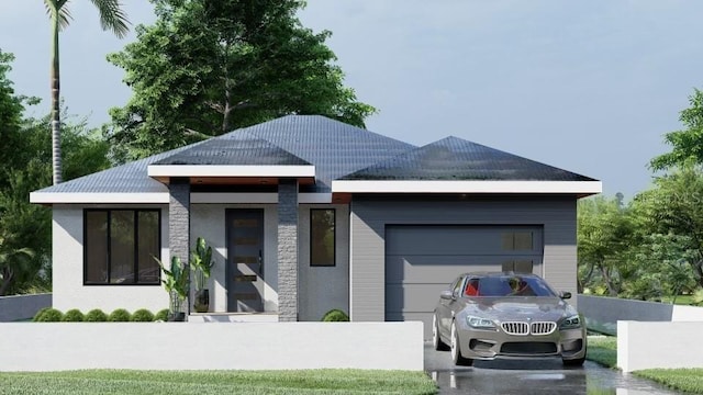 view of front of home with a garage