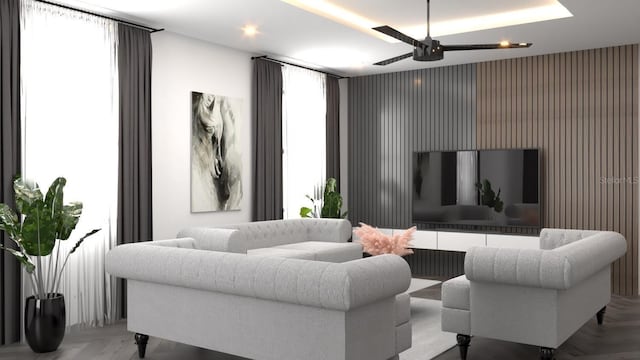 living room featuring light parquet floors and ceiling fan