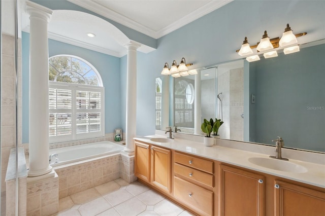 bathroom featuring vanity, crown molding, tile patterned flooring, shower with separate bathtub, and decorative columns