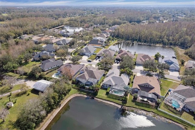 drone / aerial view with a water view