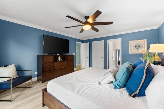 bedroom with ensuite bath, light hardwood / wood-style flooring, ornamental molding, and ceiling fan