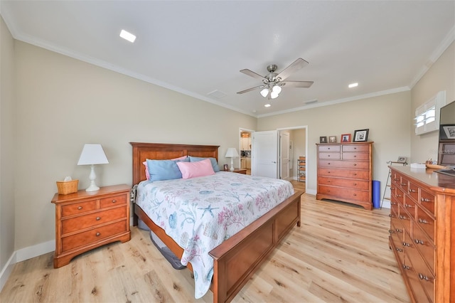 bedroom with light hardwood / wood-style floors, ceiling fan, and crown molding