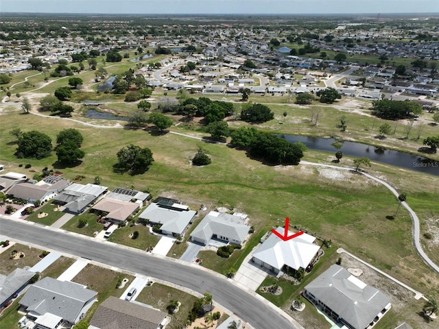 drone / aerial view with a water view