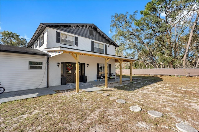 view of front of house featuring a patio