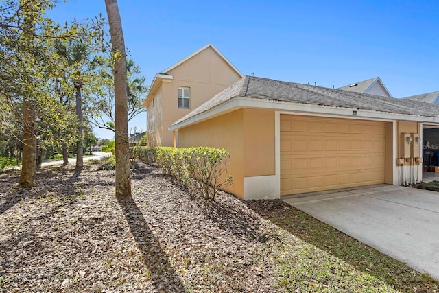 view of property exterior featuring a garage