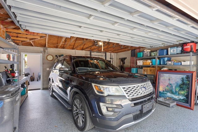 garage featuring a garage door opener