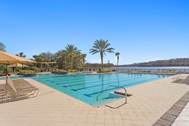 view of pool featuring a patio