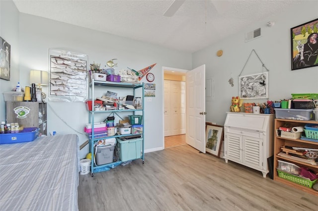 interior space featuring ceiling fan