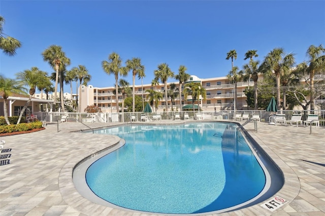 view of swimming pool with a patio