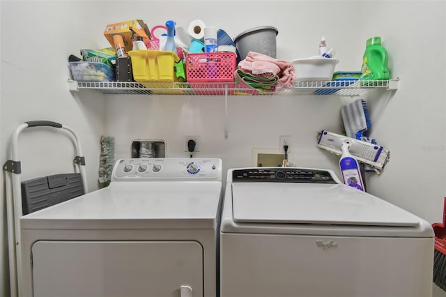 washroom featuring independent washer and dryer