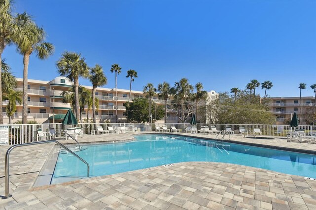 view of pool featuring a patio area