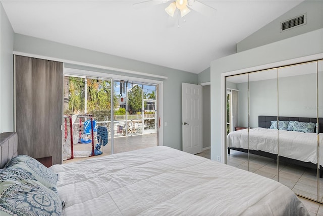 bedroom with ceiling fan, lofted ceiling, access to outside, a closet, and light tile patterned floors