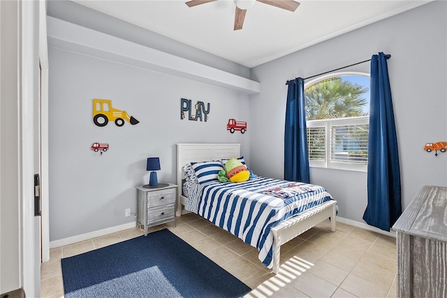 tiled bedroom with ceiling fan